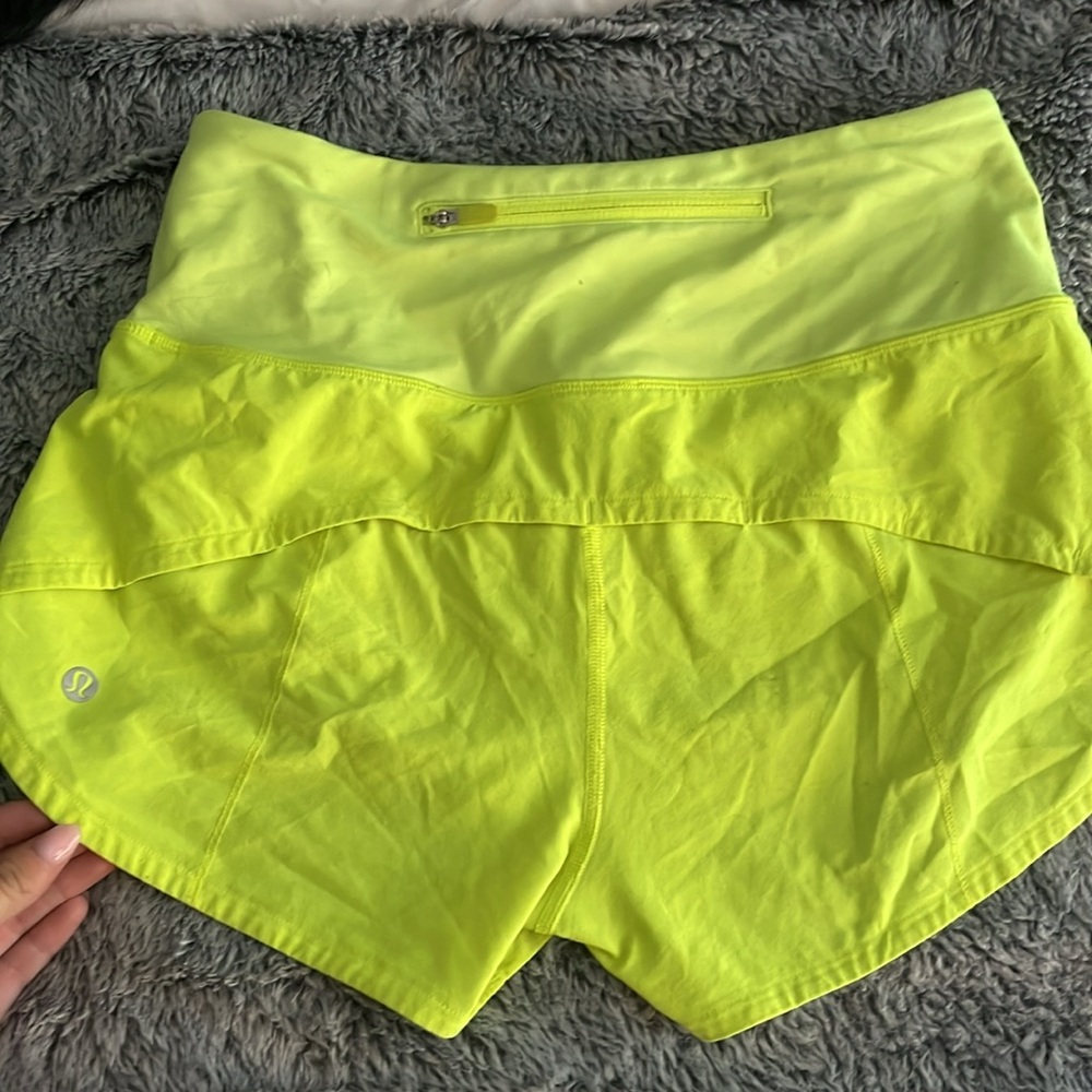 Highlight yellow high rise 2.5 inch speed up shorts